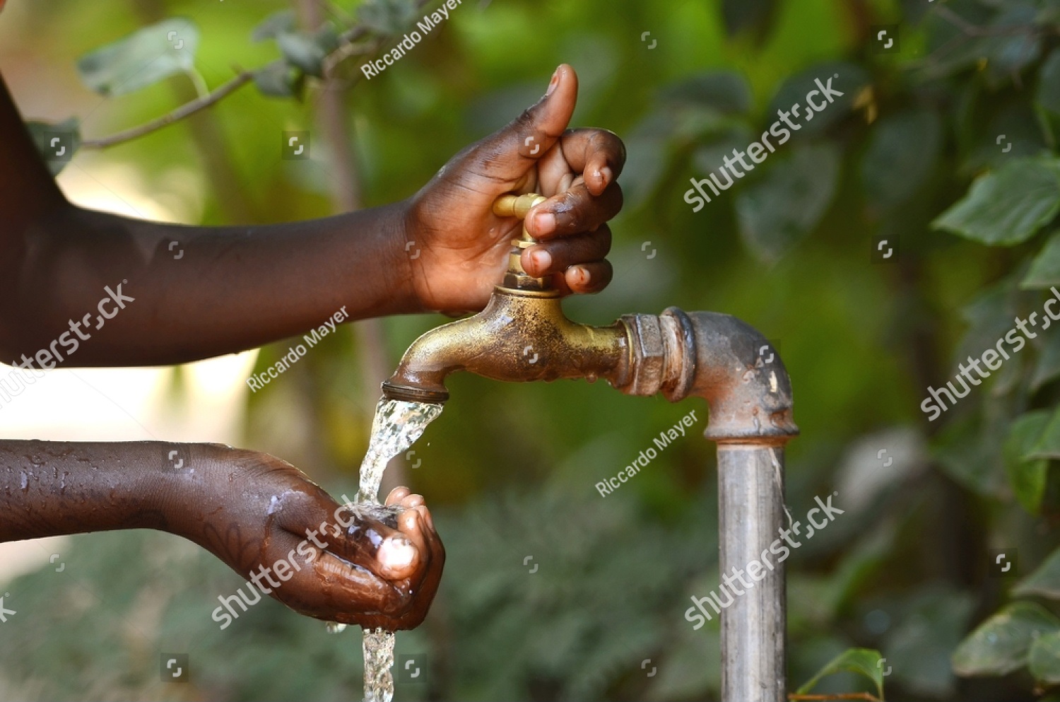 stock-photo-drinking-water-from-a-tap-water-scarsity-symbol-246601234